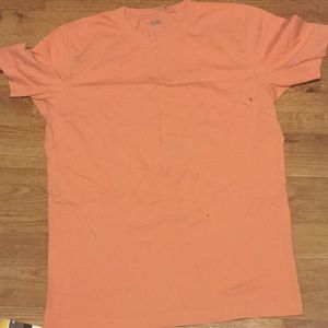Peach colored short sleeved shirt